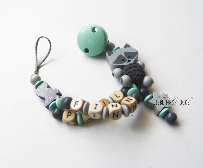 Schnullerkette Doppelname Personalisiert Waschbär Mit Dino Mint von Etsy - AnniLieblingsstuecke