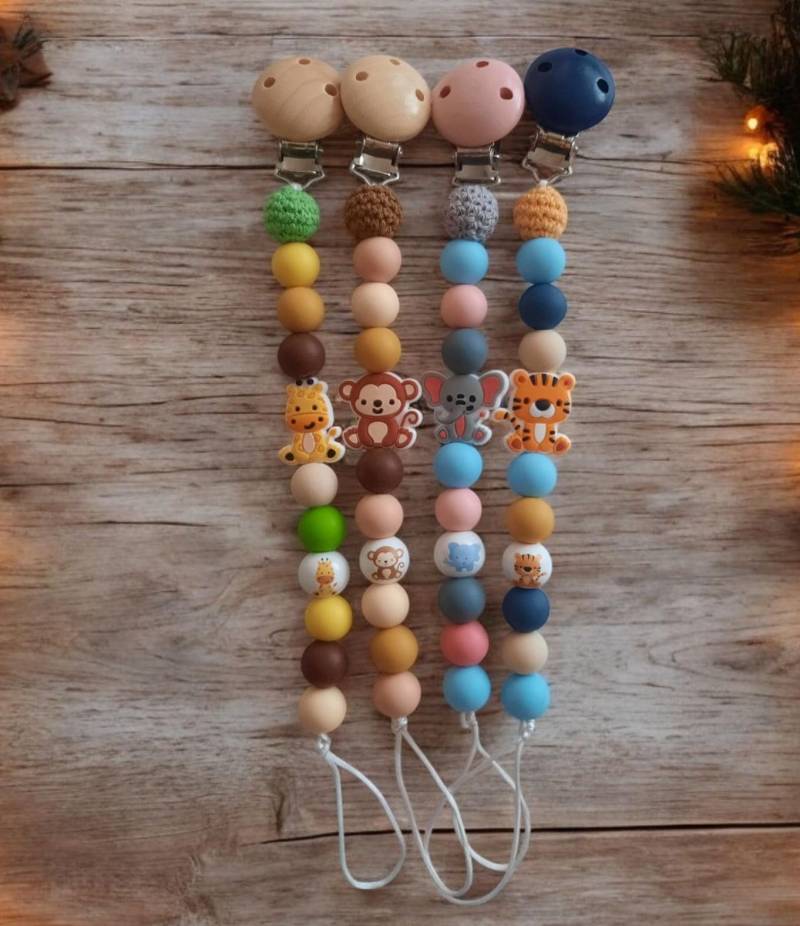 Schnullerkette Mit Holzclips Und Holsperlen von Etsy - LemeravigliedimariCo