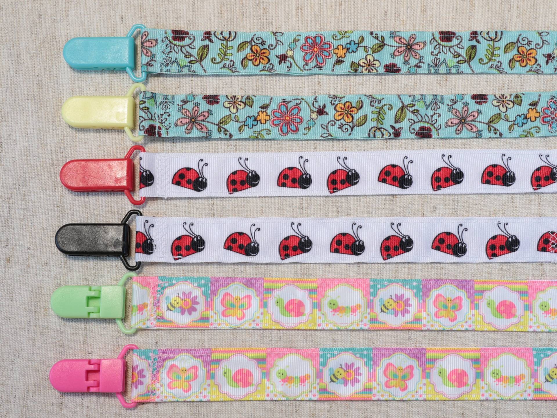 Schnullerkette Blumen - Marienkäfer Insekten Blümchen Schmetterling | Mädchen Band Paci Halter, Baby-Dusche-Geschenk, Binky Soothie Mam Schnullerkette Blumen - Marienkäfer Insekten Blümchen Schmetterling | Mädchen Band Paci Halter, Baby-Dusche-Geschenk, Binky Soothie Mam von Etsy - PrettyBittyBabyGoods