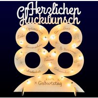 Leuchtender Aufsteller aus Holz zum 88. Geburtstag, mit 20 LEDs und gravierten Glückwünschen von Happygoods GmbH