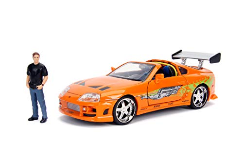 Jada Toys - Fast and Furious Modellauto Toyota Supra & Brian - Auto-Modell 1995 Toyota Supra Mk4 1:24 orange mit Brian O'Conner Figur, Fahrzeug mit Spoiler, zu öffnenden Teilen & abnehmbarem Dach von Jada Toys