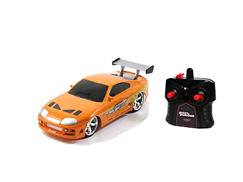 Jada Toys 253206006 Fast & Furious RC-Auto Brian's Toyota Supra-Orange, Ferngesteuertes Auto, Turbofunktion, 2-Kanal Funkfernbedienung, USB-Ladefunktion, inkl. Batterien, 1:16, orange von Jada Toys
