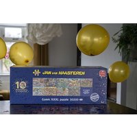 Jumbo Spiele - Jan van Haasteren - 10 Years JvH Studio Surprise item, 1000 Teile, Sort. von Jumbo Spiele