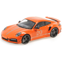 MINICHAMPS 1:18 PORSCHE 911 (992) TURBO S COUPE SPORT DESIGN - 2021 - ORANGE von MINICHAMPS