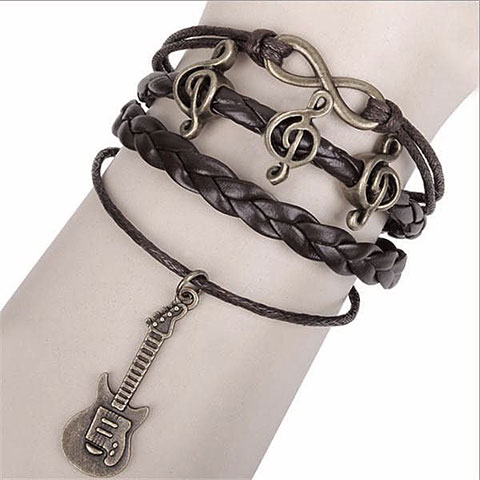 Musikboutique Kübler Bracelet - Treble Clef & Guitar, black Wristband von Musikboutique Kübler