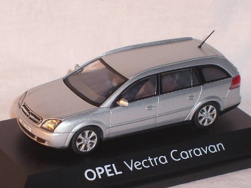 Schuco Opel Vectra C Caravan Silber 1/43 Modellauto mit Sockel und Vitrine, Größe ca 11 cm, für Little Kid, Big Kid, Förderung der Feinmotorik und Verständnis von Skalen und Größen von Schuco