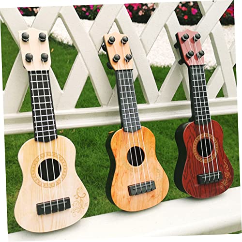 WOONEKY 2 Stück Ukulele Mini Gitarren Modell in Gelb und Braun Stabiles Kunststoff Musikinstrument für Kleinkinder zur Musikalischen Früherziehung WOONEKY 2 Stück Ukulele Mini Gitarren Modell in Gelb und Braun Stabiles Kunststoff Musikinstrument für Kleinkinder zur Musikalischen Früherziehung von WOONEKY