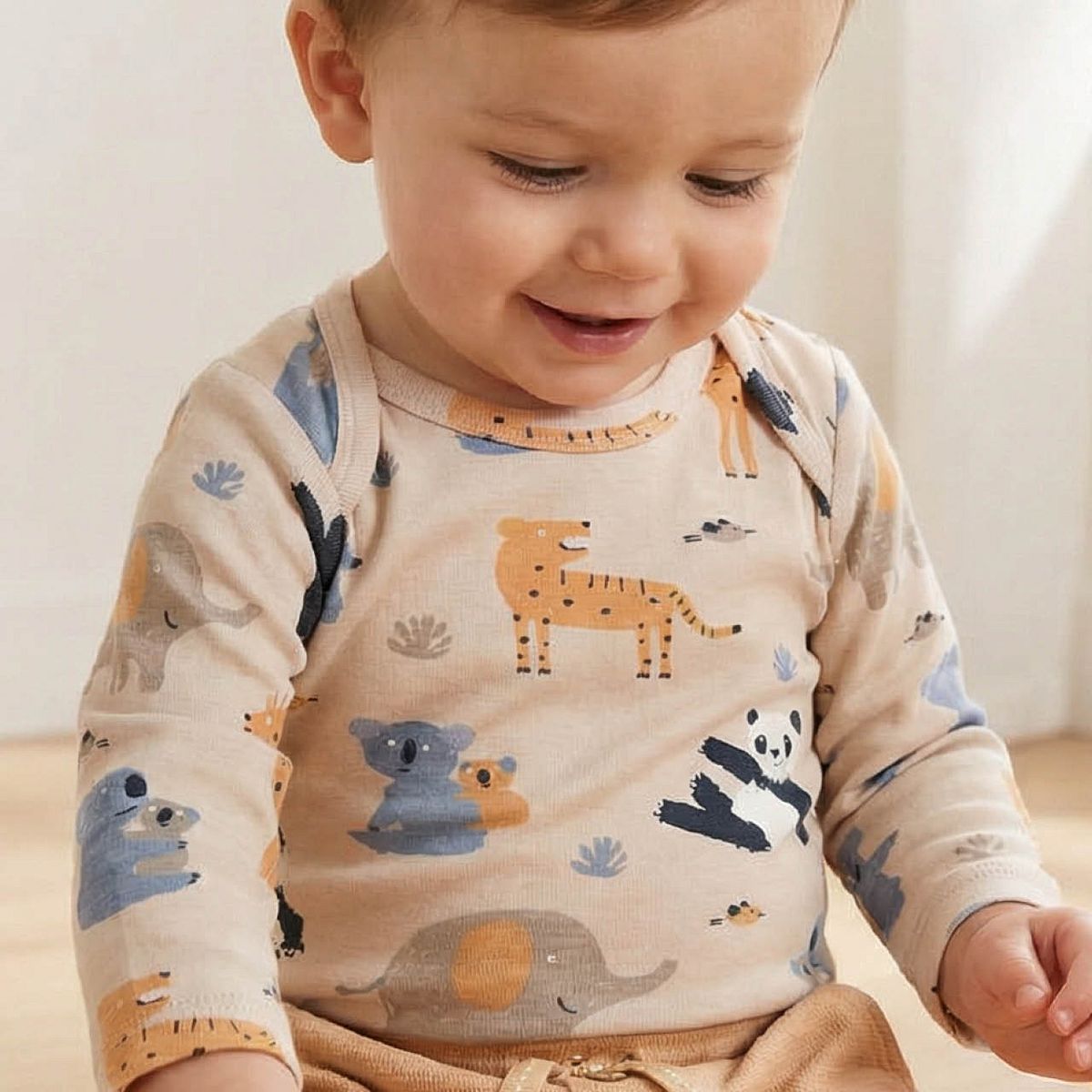 Anschmiegsamer Body langarm Waldtiere sand 98/104 Anschmiegsamer Body langarm Waldtiere sand 98/104