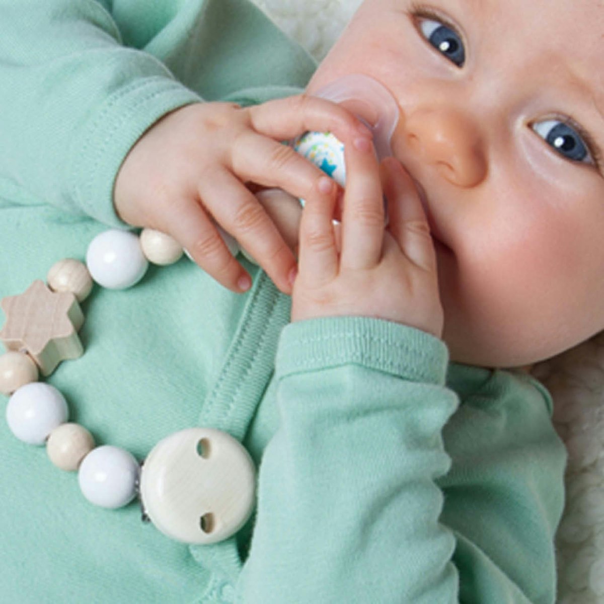 Holz-Schnullerkette Silikonring Stern Holz-Schnullerkette Silikonring Stern