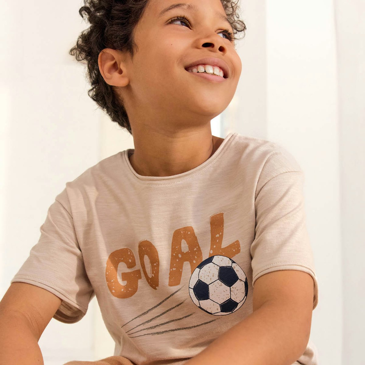 Leichtes T-Shirt Fußball beige 110/116 Leichtes T-Shirt Fußball beige 110/116