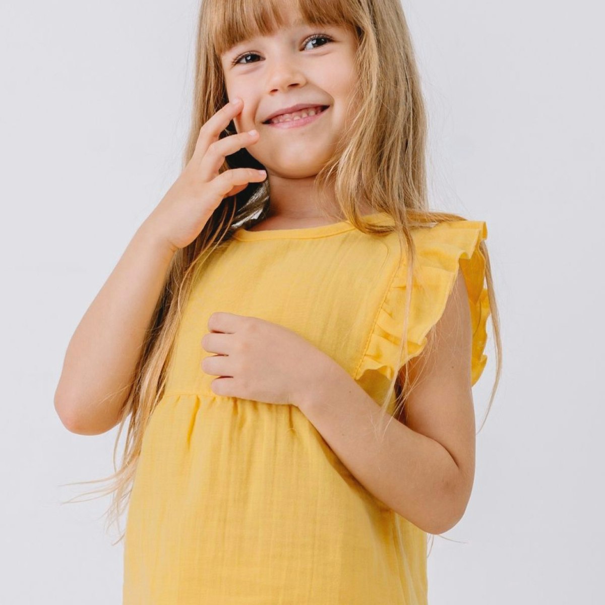 Musselin Bluse mit Voläntchen gelb 92 Musselin Bluse mit Voläntchen gelb 92