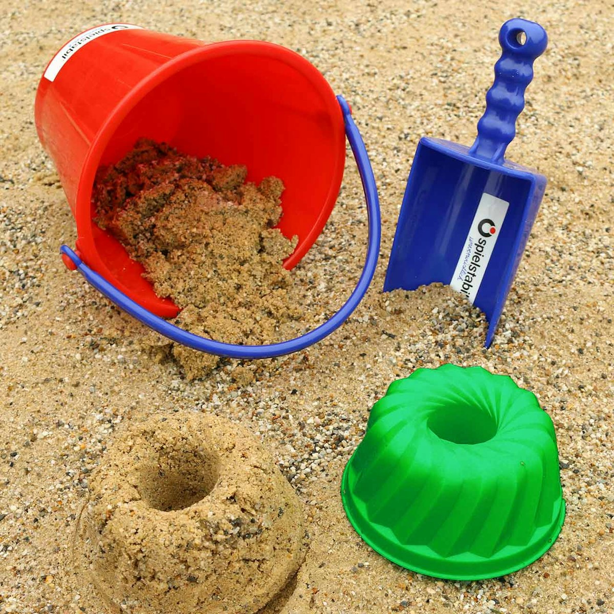 Sandspielzeug-Set zum Kuchenbacken 3-teilig Sandspielzeug-Set zum Kuchenbacken 3-teilig
