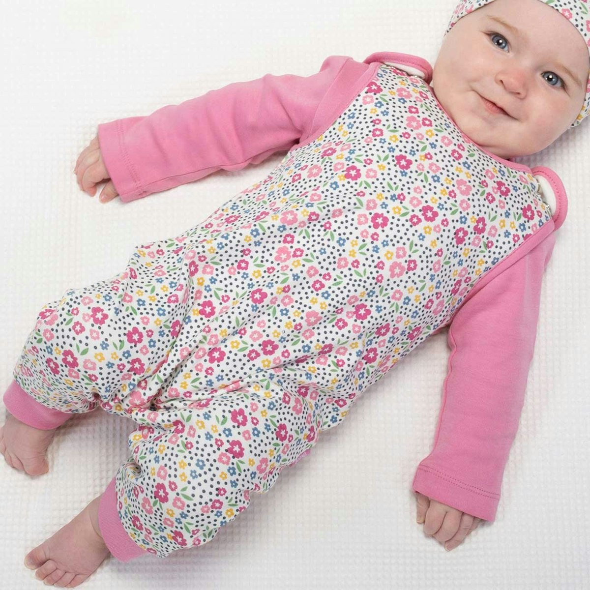 Strampler ohne Arm Blumen-Motive 56 Strampler ohne Arm Blumen-Motive 56