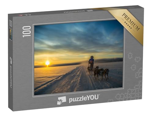 puzzleYOU: Puzzle 100 Teile „Tour mit dem Hundeschlitten im Sonnenuntergang“ – aus der Puzzle-Kollektion Landschaft von puzzleYOU